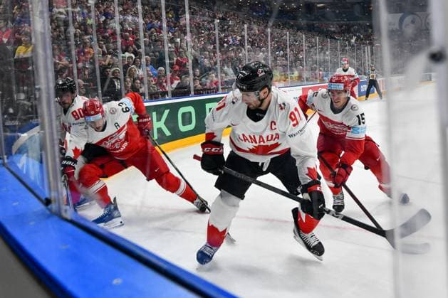 PRAGUE, CZECH REPUBLIC MAY 12 Pierre Luc Dubois of Canada L and John Tavares of Canada R battle for the puck against Patrick Russell of Denmark L and Matias Lassen of Denmark R during the preliminary round match between Denmark and Canada at Prague Arena on May 12, 2024 in Prague Prague, Czech Republic Prague Prague Arena Czech Republic Copyright: xJustPictures.ch AndreaxBrancax jp-en-EuSpIm-AB_12052024_DSC_8898