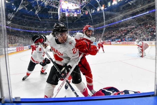 PRAGUE, CZECH REPUBLIC MAY 12 Nick Paul of Canada battles for the puck against Markus Lauridsen of Denmark during the preliminary round match between Denmark and Canada at Prague Arena on May 12, 2024 in Prague, Czech Republic Prague Prague Arena Czech Republic Copyright: xJustPictures.ch AndreaxBrancax jp-en-EuSpIm-AB_12052024_DSC_8964