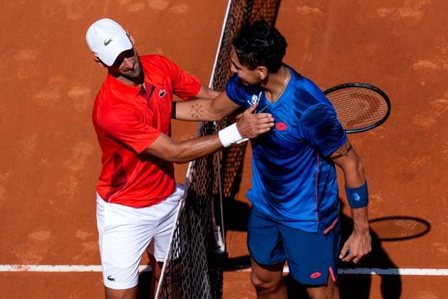 Internazionali BNL D Italia 2024 - Day Seven Novak Djokovic of Serbia shakes hands with Alejandro Tabilo of Chile after the Men s Singles match on Day Seven of Internazionali BNL D Italia 2024 at Foro Italico on May 12, 2024 in Rome, Italy. Rome Foro Italico Lazio Italy Copyright: xGiuseppexMaffiax IBI_Day7_Djokovic-Tabilo_049