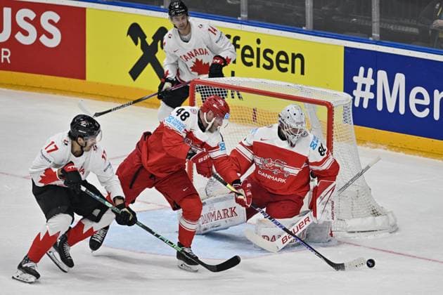 Denmark vs Canada group A match of the 2024 IIHF World Championship, WM, Weltmeisterschaft in Prague, Czech Republic, on May 12, 2024. From left Jack McBain of Canada, Nicholas B. Jensen of Denmark, Frederik Dichow of Denmark. (CTKxPhoto VitxSimanek) CTKPhotoP2024051204558  CTKPhotoP2024051204558