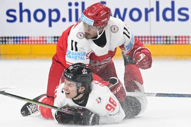 Denmark vs Canada group A match of the 2024 IIHF World Championship, WM, Weltmeisterschaft in Prague, Czech Republic, on May 12, 2024. Connor Bedard of Canada (down) and Alexander True of Denmark. (CTKxPhoto MichalxKamaryt) CTKPhotoP2024051204592  CTKPhotoP2024051204592