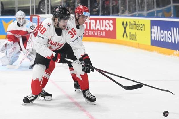 Denmark vs Canada group A match of the 2024 IIHF World Championship, WM, Weltmeisterschaft in Prague, Czech Republic, on May 12, 2024. From left Brandon Hagel of Canada, Matias Lassen of Denmark. (CTKxPhoto MichalxKamaryt) CTKPhotoP2024051204593  CTKPhotoP2024051204593