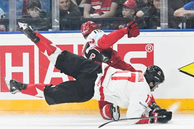 Denmark vs Canada group A match of the 2024 IIHF World Championship, WM, Weltmeisterschaft in Prague, Czech Republic, on May 12, 2024. From left Jack McBain of Canada, Matias Lassen of Denmark. (CTKxPhoto MichalxKamaryt) CTKPhotoP2024051204595  CTKPhotoP2024051204595