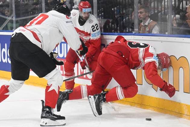 Denmark vs Canada group A match of the 2024 IIHF World Championship, WM, Weltmeisterschaft in Prague, Czech Republic, on May 12, 2024. From right Nick Paul of Denmark and Patrick Russell of Canada. (CTKxPhoto MichalxKamaryt) CTKPhotoP2024051204598  CTKPhotoP2024051204598
