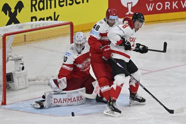 Denmark vs Canada group A match of the 2024 IIHF World Championship, WM, Weltmeisterschaft in Prague, Czech Republic, on May 12, 2024. From left goalie of Denmark Frederik Dichow, Nicholas Jensen of Denmark, Michael Bunting of Canada. (CTKxPhoto VitxSimanek) CTKPhotoP2024051204645  CTKPhotoP2024051204645