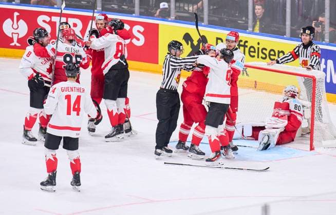 Connor Bedard CAN 98 Pierre-Luc Dubois Nr. 80 of Canada Michael Bunting CAN 8 fighting with Jesper JENSEN AABO, DEN 41 in the preliminary round match DENMARK - CANADA 1-5 of the IIHF Ice hockey, Eishockey World Championship, WM, Weltmeisterschaft Group A in Prague, Czechia, May 12, 2024, Season 2023 2024