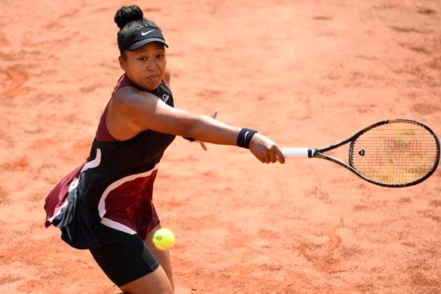 Naomi Osaka of Japan in action during the match against Qinwen Zheng of China at the Internazionali BNL d Italia 2024 tennis tournament at Foro Italico in Rome, Italy on May 13, 2024. antoniettaxbaldassarre