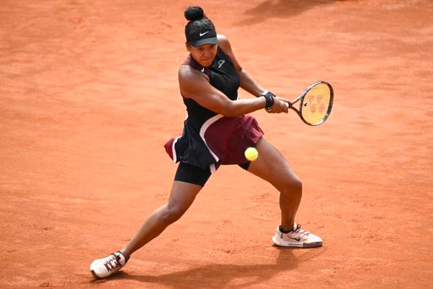 Naomi Osaka of Japan in action during the match against Qinwen Zheng of China at the Internazionali BNL d Italia 2024 tennis tournament at Foro Italico in Rome, Italy on May 13, 2024. antoniettaxbaldassarre