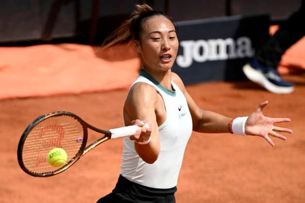 Qinwen Zheng of China in action during the match against Naomi Osaka of Japan at the Internazionali BNL d Italia 2024 tennis tournament at Foro Italico in Rome, Italy on May 13, 2024. antoniettaxbaldassarre