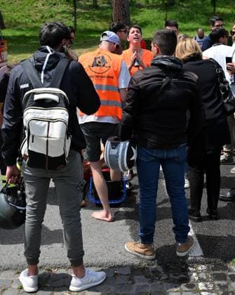 May 13, 2024, Rome, Italy: Ambientalisti di Fondo Riparazione circondati dalla polizia mentre vengono allontanati dal campo Pietrangeli, dove era in corso la partita tra Keys e Cirstea agli Internazionali di tennis, al Foro Italico, che e stata interrotta dalla loro azione di protesta, Roma, 13 maggio 2024. ANSA ETTORE FERRARI Environmentalists, of Fondo Riparazione (Repairing Fund) movement, being taken away from Pietrangeli field by the police after their protest with which they interrupted the match between Keys and Cirstea at the Italian Open tennis tournament, at the Foro Italico, Rome, Italy, 13 May 2024. ANSA ETTORE FERRARI Internazionali: vernice sul campo da ambientalisti, stop a match  - ZUMAa110 20240513_zaf_a110_014 Copyright: xEttorexFerrarix