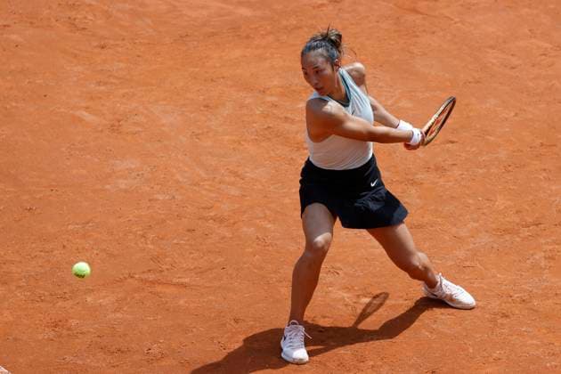 May 13, 2024, Rome, Lazio, Italy: Qinwen Zheng (CHN) is playing during the round of 16 match against Naomi Osaka (JPN) on day eight of the Internazionali BNL D Italia 2024 at Foro Italico on May 13., 2024 in Rome, Italy. Rome Italy - ZUMAl131 20240513_zsp_l131_007 Copyright: xCiroxDexLucax