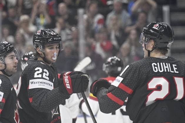 Dylan Cozens (CAN; left) receives congratulations on his goal from teammate Kaiden Guhle (CAN; right) during the 2024 IIHF World Championship, WM, Weltmeisterschaft group A, match Canada vs Austria, in Prague, Czech Republic, on May 14, 2024. (CTKxPhoto MichalxKamaryt) CTKPhotoP2024051409140  CTKPhotoP2024051409140