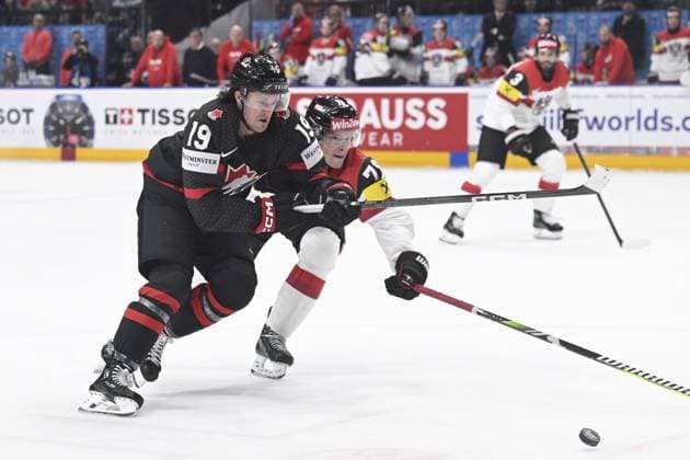 L-R Jared McCann (CAN) and Thimo Nickl (AUT) in action during the 2024 IIHF World Championship, WM, Weltmeisterschaft group A, match Canada vs Austria, in Prague, Czech Republic, on May 14, 2024. (CTKxPhoto MichalxKamaryt) CTKPhotoP2024051409195  CTKPhotoP2024051409195