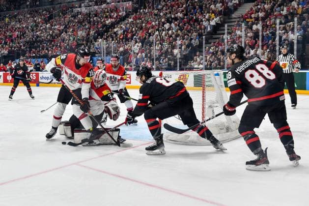 PRAGUE, CZECH REPUBLIC MAY 14 goalkeeper David Madlener of Austria and Paul Stapelfeldt of Austria battle for the puck during the preliminary round match between Canada and Austria at Prague Arena on May 14, 2024 in Prague, Czech Republic Prague Czech Republic Copyright: xJustPictures.ch AndreaxBrancax jp-en-EuSpIm-AB_14052024_DSC_0220