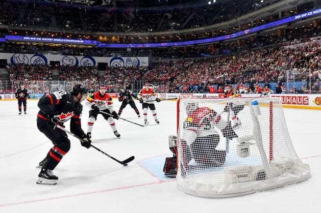 PRAGUE, CZECH REPUBLIC MAY 14 Nick Paul of Canada tries to score against goalkeeper David Madlener of Austria during the preliminary round match between Canada and Austria at Prague Arena on May 14, 2024 in Prague, Czech Republic Prague Czech Republic Copyright: xJustPictures.ch AndreaxBrancax jp-en-EuSpIm-AB_14052024_DSC_0325