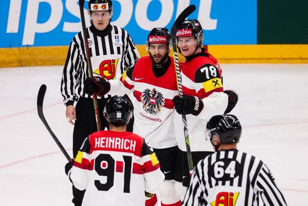 Sport Bilder des Tages Ice hockey, Eishockey - IIHF WC 2024 PRAGUE,CZECH REPUBLIC,14.MAY.24 - ICE HOCKEY - IIHF Ice Hockey World Championship, WM, Weltmeisterschaft 2024, group stage, Austria vs Canada. Image shows the rejoicing of Benjamin Nissner and Thimo Nickl (AUT).  GEPAxpictures xDanielxGoetzhaber