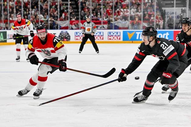 PRAGUE, CZECH REPUBLIC MAY 14 Benjamin Nissner of Austria shoots the puck against Kaiden Guhle of Canada during the preliminary round match between Canada and Austria at Prague Arena on May 14, 2024 in Prague, Czech Republic Prague Czech Republic Copyright: xJustPictures.ch AndreaxBrancax jp-en-EuSpIm-AB_14052024_AAB_9253