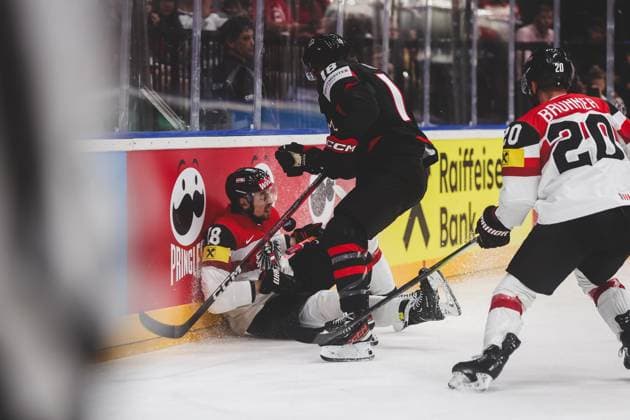Ice hockey, Eishockey - IIHF WC 2024 PRAGUE,CZECH REPUBLIC,14.MAY.24 - ICE HOCKEY - IIHF Ice Hockey World Championship, WM, Weltmeisterschaft 2024, group stage, Austria vs Canada. Image shows Dawson Mercer (CAN) and Paul Stapelfeldt (AUT).  GEPAxpictures xDanielxGoetzhaber