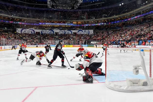 PRAGUE, CZECH REPUBLIC MAY 14 Dylan Cozens of Canada in action against goalkeeper David Madlener of Austria during the preliminary round match between Canada and Austria at Prague Arena on May 14, 2024 in Prague, Czech Republic Prague Czech Republic Copyright: xJustPictures.ch AndreaxBrancax jp-en-EuSpIm-AB_14052024_DSC_0424