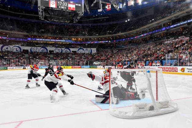 PRAGUE, CZECH REPUBLIC MAY 14 goalkeeper David Madlener of Austria makes a save against Dylan Cozens of Canada during the preliminary round match between Canada and Austria at Prague Arena on May 14, 2024 in Prague, Czech Republic Prague Czech Republic Copyright: xJustPictures.ch AndreaxBrancax jp-en-EuSpIm-AB_14052024_DSC_0427