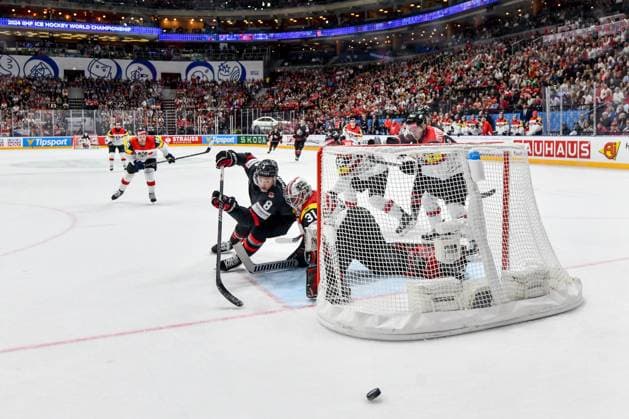 PRAGUE, CZECH REPUBLIC MAY 14 Michael Bunting of Canada in action against goalkeeper David Madlener of Austria during the preliminary round match between Canada and Austria at Prague Arena on May 14, 2024 in Prague, Czech Republic Prague Czech Republic Copyright: xJustPictures.ch AndreaxBrancax jp-en-EuSpIm-AB_14052024_DSC_0576
