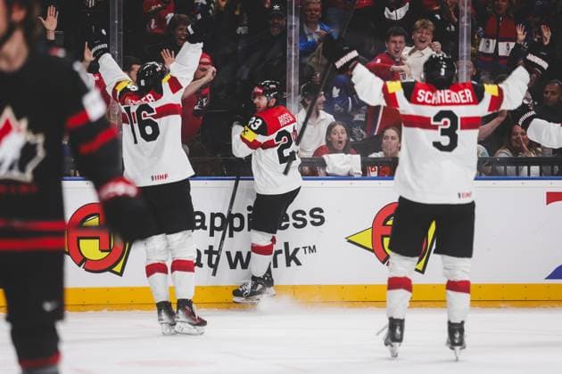 Ice hockey, Eishockey - IIHF WC 2024 PRAGUE,CZECH REPUBLIC,14.MAY.24 - ICE HOCKEY - IIHF Ice Hockey World Championship, WM, Weltmeisterschaft 2024, group stage, Austria vs Canada. Image shows the rejoicing of Dominic Zwerger, Marco Rossi and Peter Schneider (AUT).  GEPAxpictures xDanielxGoetzhaber
