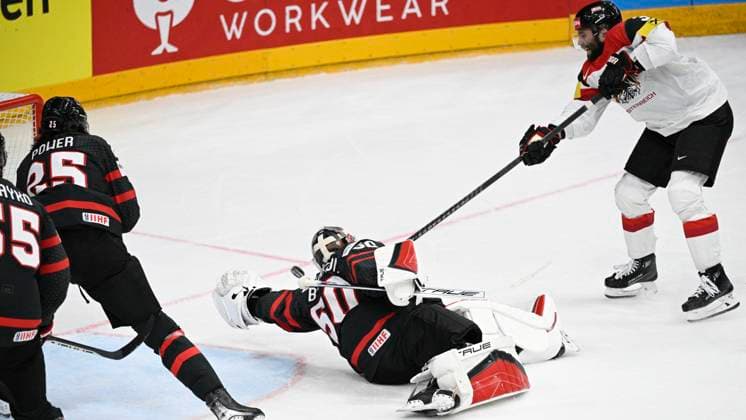 L-R Colton Parayko (CAN), Owen Power (CAN), goalkeeper Jordan Binnington and scoring Peter Schneider (AUT) in action during the 2024 IIHF World Championship, WM, Weltmeisterschaft group A, match Canada vs Austria, in Prague, Czech Republic, on May 14, 2024. (CTKxPhoto MichalxKamaryt) CTKPhotoP2024051410241  CTKPhotoP2024051410241