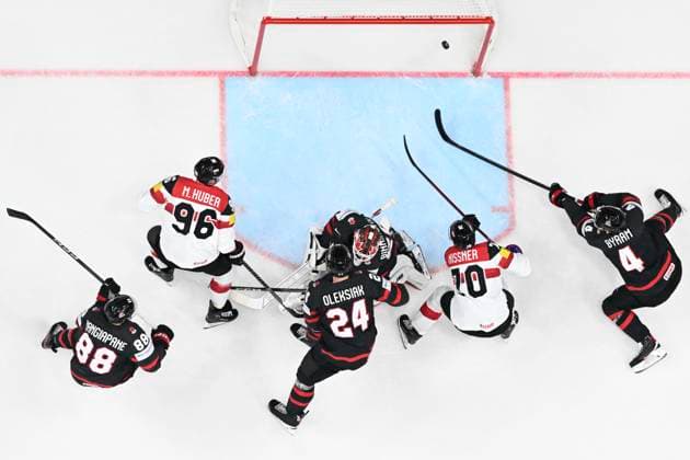 L-R Andrew Mangiapane (CAN), Mario Huber (AUT), Jamie Oleksiak (CAN), goalkeeper Jordan Binnington (CAN), scoring Benjamin Nissner (AUT) and Bowen Byram (CAN) in action during the 2024 IIHF World Championship, WM, Weltmeisterschaft group A, match Canada vs Austria, in Prague, Czech Republic, on May 14, 2024. (CTKxPhoto MichalxKamaryt) CTKPhotoP2024051410499 CTKPhotoP2024051410499