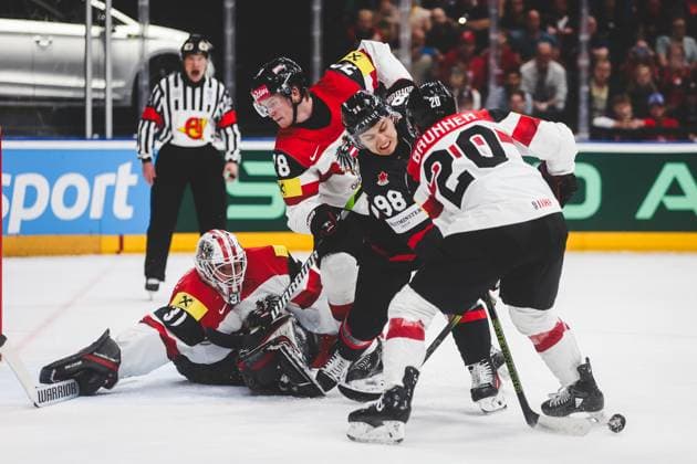 Ice hockey, Eishockey - IIHF WC 2024 PRAGUE,CZECH REPUBLIC,14.MAY.24 - ICE HOCKEY - IIHF Ice Hockey World Championship, WM, Weltmeisterschaft 2024, group stage, Austria vs Canada. Image shows David Madlener, Thimo Nickl (AUT) and Connor Bedard (CAN).  GEPAxpictures xDanielxGoetzhaber