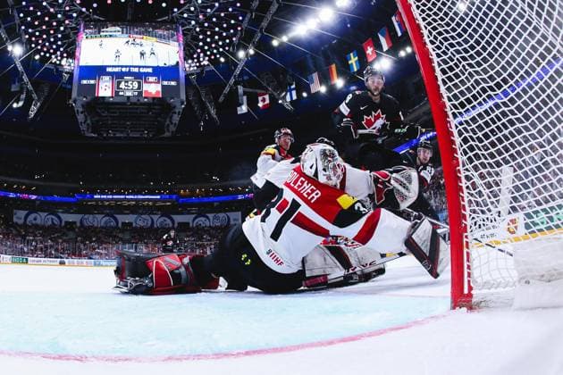 Ice hockey, Eishockey - IIHF WC 2024 PRAGUE,CZECH REPUBLIC,14.MAY.24 - ICE HOCKEY - IIHF Ice Hockey World Championship, WM, Weltmeisterschaft 2024, group stage, Austria vs Canada. Image shows Benjamin Baumgartner, David Madlener (AUT), Michael Bunting and Andrew Mangiapane (CAN). Keywords: netcam.  GEPAxpictures xDanielxGoetzhaber
