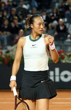 (240515) -- ROME, May 15, 2024 -- Zheng Qinwen of China celebrates a point during the women s singles quarterfinal match between Zheng Qinwen of China and Coco Gauff of the United States at the WTA, Tennis Damen Italian Open in Rome, Italy, May 14, 2024. ) (SP) ITALY-ROME-TENNIS-WTA-ITALIAN OPEN-QUARTERFINAL LixJing 