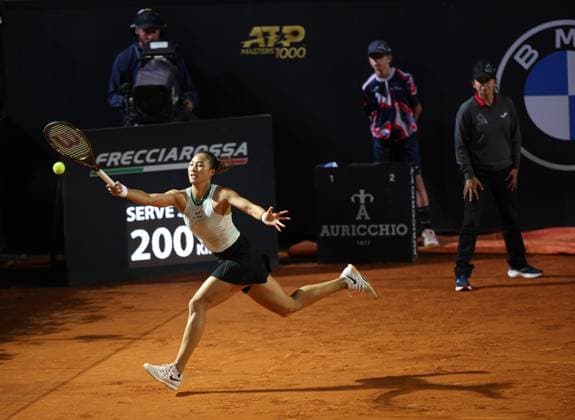 (240515) -- ROME, May 15, 2024 -- Zheng Qinwen of China returns a shot during the women s singles quarterfinal match between Zheng Qinwen of China and Coco Gauff of the United States at the WTA, Tennis Damen Italian Open in Rome, Italy, May 14, 2024. ) (SP) ITALY-ROME-TENNIS-WTA-ITALIAN OPEN-QUARTERFINAL LixJing 