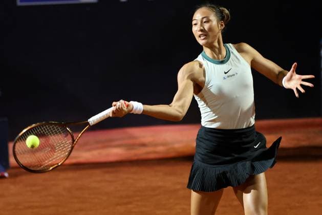 (240515) -- ROME, May 15, 2024 -- Zheng Qinwen of China returns a shot during the women s singles quarterfinal match between Zheng Qinwen of China and Coco Gauff of the United States at the WTA, Tennis Damen Italian Open in Rome, Italy, May 14, 2024. ) (SP) ITALY-ROME-TENNIS-WTA-ITALIAN OPEN-QUARTERFINAL LixJing 