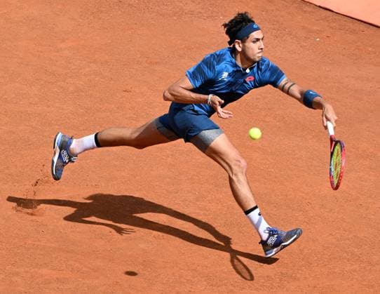 (240516) -- ROME, May 16, 2024 -- Alejandro Tabilo returns a shot during the men s singles quarterfinal match between Zhang Zhizhen of China and Alejandro Tabilo of Chile at the Italian Open in Rome, Italy, May 15, 2024. (Photo by Xinhua) (SP)ITALY-ROME-TENNIS ATP, Tennis Herren ITALIAN OPEN-QUARTERFINAL AlbertoxLingria 
