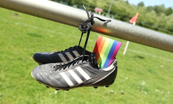 A rainbow armband Diversity captains armband is stuck in a soccer boot Symbolic image Symbolic photo for the group coming out of professional footballers announced for May 17 Winterhude Hamburg