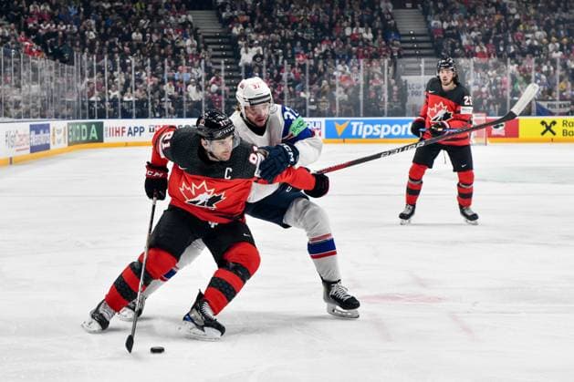 PRAGUE, CZECH REPUBLIC MAY 16 John Tavares of Canada protects the puck from Markus Vikingstad of Norway during the preliminary round match between Canada and Norway at Prague Arena on May 16, 2024 in Prague, Czech Republic Prague Prague Arena Czech Republic Copyright: xJustPictures.ch AndreaxBrancax jp-en-EuSpIm-AB_16052024_DSC_1788