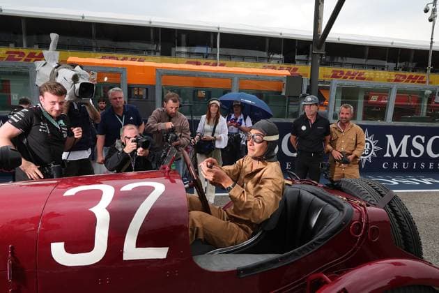 Formula 1 Grand Prix Emilia Romagna 2024 16 05 2024, Autodromo Enzo e Dino Ferrari, Imola, Formula 1 Grand Prix Emilia Romagna 2024 ,in the picture George Russell GBR , Mercedes AMG Petronas Formula One Team drives with an original Mercedes car that participated in the Targa Florio in 1924 nordphotoxGmbHx xBratic nph00250