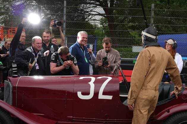 Formula 1 Grand Prix Emilia Romagna 2024 16 05 2024, Autodromo Enzo e Dino Ferrari, Imola, Formula 1 Grand Prix Emilia Romagna 2024 ,in the picture George Russell GBR , Mercedes AMG Petronas Formula One Team drives with an original Mercedes car that participated in the Targa Florio in 1924 nordphotoxGmbHx xBratic nph00250
