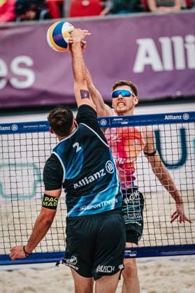 Beach volleyball women German Beach Tour 2024 Tour stop Düsseldorf 17 05 2024 At the net Milan Sievers right grabs the arm of Nico Wegner left City Sports venue Federal state Germany