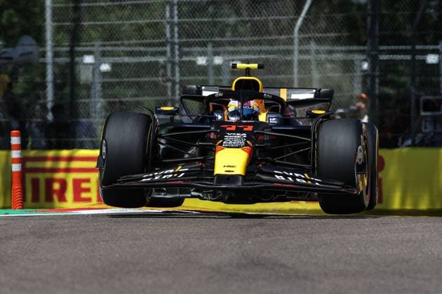 11 PEREZ Sergio (mex), Red Bull Racing RB20, action during the Formula 1 MSC Cruises Gran Premio del Made in Italy e Dell™Emilia-Romagne 2024, 7th round of the 2024 Formula One World Championship, WM, Weltmeisterschaft from May 17 to 19, 2024 on the Autodromo Enzo e Dino Ferrari, in Imola, Italy - F1 - EMILIA-ROMAGNA GRAND PRIX 2024 DPPI Panoramic  240518_R07_EMR_DP_XB3_9970_1
