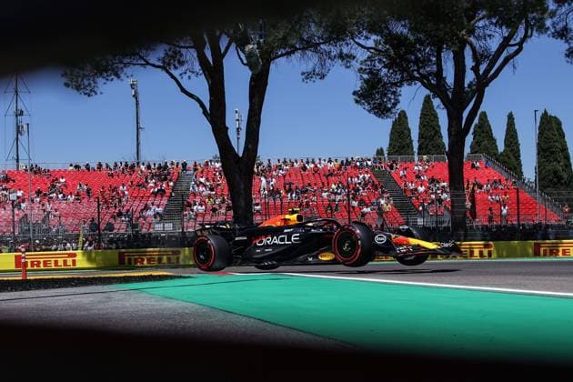 11 PEREZ Sergio (mex), Red Bull Racing RB20, action during the Formula 1 MSC Cruises Gran Premio del Made in Italy e Dell™Emilia-Romagne 2024, 7th round of the 2024 Formula One World Championship, WM, Weltmeisterschaft from May 17 to 19, 2024 on the Autodromo Enzo e Dino Ferrari, in Imola, Italy - F1 - EMILIA-ROMAGNA GRAND PRIX 2024 DPPI Panoramic  240518_R07_EMR_DP_XB5_9444