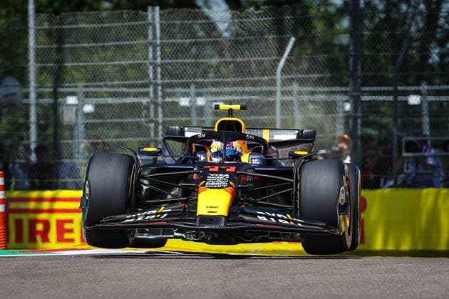 11 PEREZ Sergio (mex), Red Bull Racing RB20, action during the Formula 1 MSC Cruises Gran Premio del Made in Italy e Dell™Emilia-Romagne 2024, 7th round of the 2024 Formula One World Championship, WM, Weltmeisterschaft from May 17 to 19, 2024 on the Autodromo Enzo e Dino Ferrari, in Imola, Italy - F1 - EMILIA-ROMAGNA GRAND PRIX 2024 DPPI Panoramic  240518_R07_EMR_DP_XB3_9970