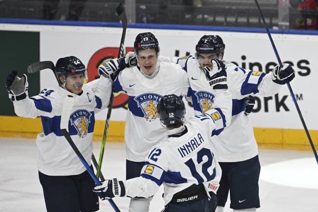 (L-R) Jesse Puljujarvi, Jere Innala, Mikael Granlund and Oliwer Kaski of Finland celebrate a goal during the 2024 IIHF World Championship, WM, Weltmeisterschaft group A match Canada vs Finland in Prague, Czech Republic, May 18, 2024. (CTKxPhoto VitxSimanek) CTKPhotoP2024051804285  CTKPhotoP2024051804285