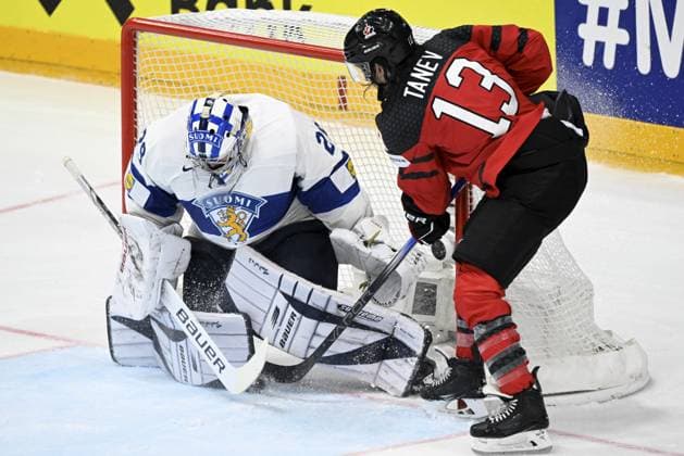 Goalkeeper Harri Säteri of Finland and Brandon Tanev of Canada during the 2024 IIHF Ice hockey, Eishockey World Championships preliminary round group A match between Canada and Finland in Prague on May 18, 2024. Prague Czechia LKFTJK20240518175135FFLT  Copyright: xEmmixKorhonenx LKFTJK20240518175135FFLT