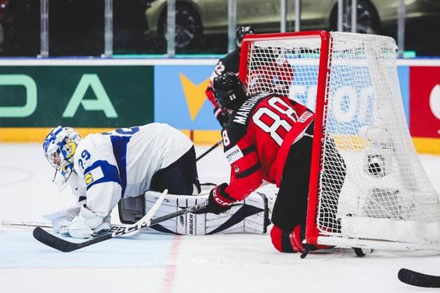 Ice hockey, Eishockey - IIHF WC 2024 PRAGUE,CZECH REPUBLIC,18.MAY.24 - ICE HOCKEY - IIHF Ice Hockey World Championship, WM, Weltmeisterschaft 2024, group stage, Canada vs Finland. Image shows Herri Saeteri (FIN) and Andrew Mangiapane (CAN).  GEPAxpictures xDanielxGoetzhaber