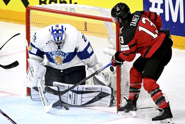 Goalkeeper Harri Säteri of Finland and Brandon Tanev of Canada during the 2024 IIHF Ice hockey, Eishockey World Championships preliminary round group A match between Canada and Finland in Prague on May 18, 2024. Prague Czechia LKFTJK20240518175451NGSK  Copyright: xEmmixKorhonenx LKFTJK20240518175451NGSK