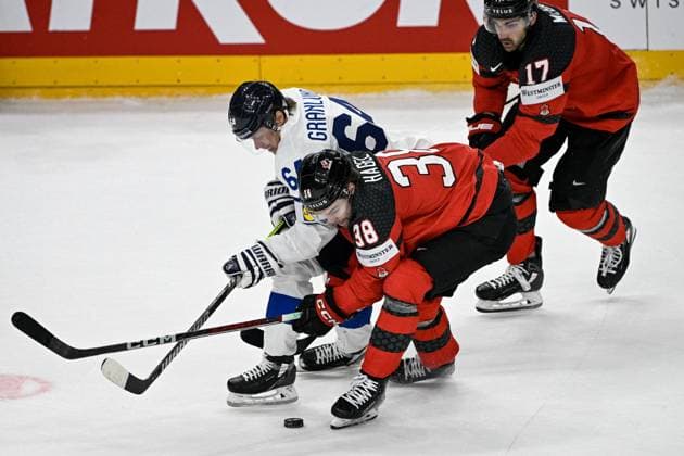 (L-R) Mikael Granlund of Finland, Brandon Hagel and Jack McBain of Canada during the 2024 IIHF World Championship, WM, Weltmeisterschaft group A match Canada vs Finland in Prague, Czech Republic, May 18, 2024. (CTKxPhoto VitxSimanek) CTKPhotoP2024051805593  CTKPhotoP2024051805593