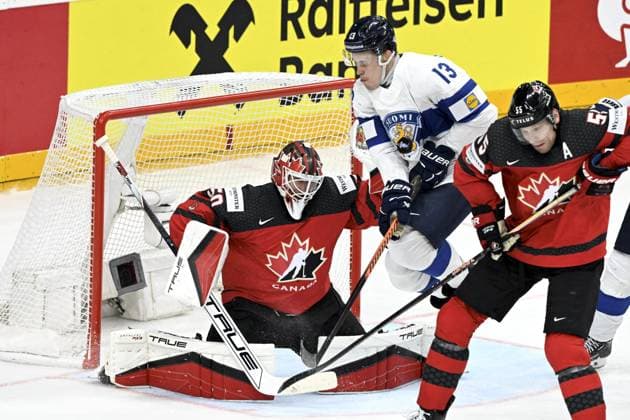 Goalkeeper Jordan Binnington of Canada and Jesse Puljujärvi (13) of Finland during the 2024 IIHF Ice hockey, Eishockey World Championships preliminary round group A match between Canada and Finland in Prague on May 18, 2024, right Canada s Colton Parayko. Prague Czechia LKFTJK20240518193747XVPQ  Copyright: xEmmixKorhonenx LKFTJK20240518193747XVPQ