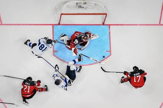 (L-R) Kaiden Guhle of Canada, Iiro Pakarinen and Ahti Oksanen of Finland, goalkeeper of Canada Jordan Binnington and Jack McBain of Canada in action during the 2024 IIHF World Championship, WM, Weltmeisterschaft group A match Canada vs Finland in Prague, Czech Republic, May 18, 2024. (CTKxPhoto VitxSimanek) CTKPhotoP2024051805937  CTKPhotoP2024051805937
