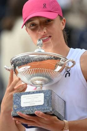 Iga Swiatek of Poland celebrates with the prize the victory of the match against Belarus Aryna Sabalenka at the Internazionali BNL d Italia 2024 tennis WTA, Tennis Damen final at Foro Italico in Rome, Italy on May 18th, 2024. antoniettaxbaldassarre